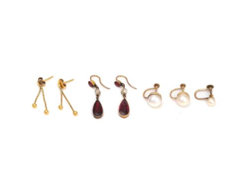 THREE PAIRS OF EARRINGS AND ONE ODD EARRING (4)Comprising; a pair of gold, garnet and freshwater pearl pendant earrings, with