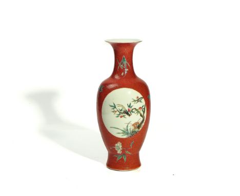 A CHINESE FAMILLE-ROSE SLENDER BALUSTER VASEQianlong seal mark but laterOne side painted with a bird in branches of fruiting 