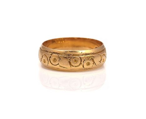 AN 18CT GOLD WEDDING RINGWith floral decoration, Birmingham 1908, ring size J and a half, weight 3.4 gms