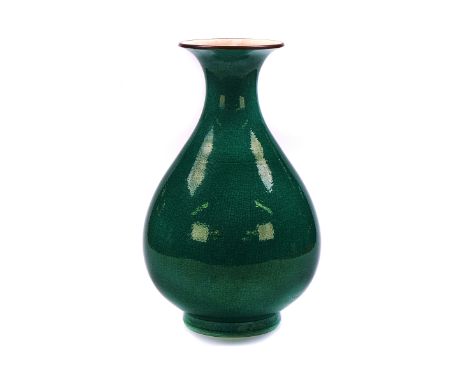 A LARGE CHINESE PEAR- SHAPED VASECovered in a green crackle glaze, 32cm highgood condition