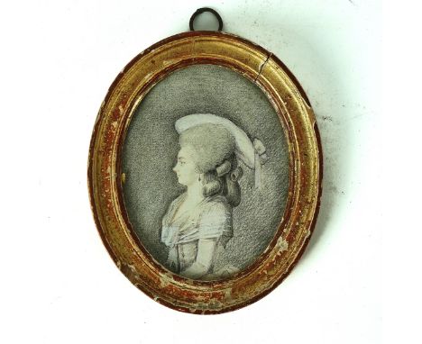 FRENCH SCHOOL: PORTRAIT MINIATURE OF A YOUNG LADY IN PROFILELate 18th / Early 19th CenturyPencil &amp; watercolour, oval 9.5c