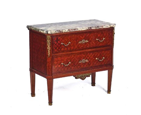 A LOUIS XVI STYLE COMMODEThe canted rectangular Breche violette marble top over a gilt metal mounted parquetry inlaid, with t