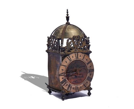 A BRASS LANTERN CLOCKInscribed Thos Moore, Ipswich, 20th CenturyOf typical form, surmounted by a bell, five finials and pierc