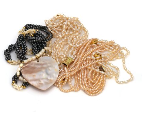A FOUR ROW BRACELET OF FRESHWATER CULTURED PEARLS, ON A GOLD, RUBY AND DIAMOND CLASP AND FOUR NECKLACES (5)The clasp detailed