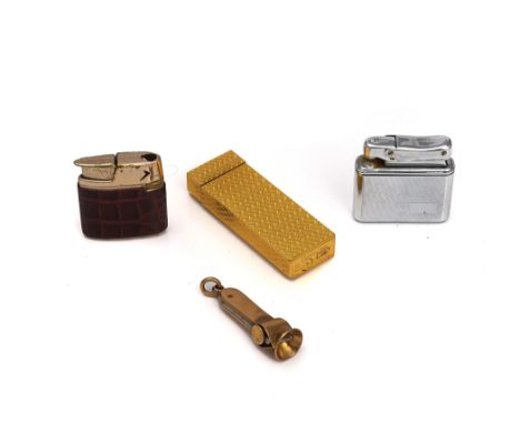 A CARTIER GILT METAL RECTANGULAR GAS LIGHTERTwo further lighters, comprising; Ronson with a case and Colibri, with a case, gu