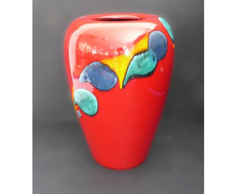 A large Poole Pottery 'Odyssey' concave vase in flambé&nbsp;glaze with green, blue and yellow enamel splash decoration. (34 c