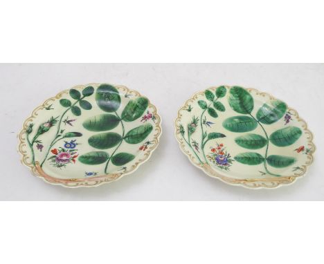 A pair of 18th century first period Worcester gilt scallop-edged dessert plates in the 'Blind Earl' pattern: decorated in col