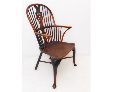 A late 18th century yew wood Windsor chair: pierced splat and yew wood bow above an elm saddle-shaped seat, cabriole front le