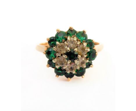 A lady's 9-carat yellow gold dress ring (maker's mark of 'A. &amp; Co.'): centrally mounted with a small uncut green stone su