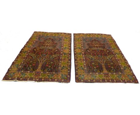 A fine pair of circa 1935&nbsp;Kerman (South Persia)&nbsp;carpets: tree of life (pomegranate)&nbsp;design&nbsp;with various b