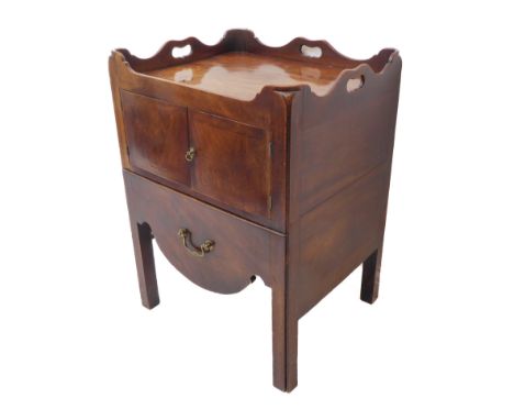 An 18th century mahogany tray top commode of good colour: the back and sides with pierced handles above two banded doors furt