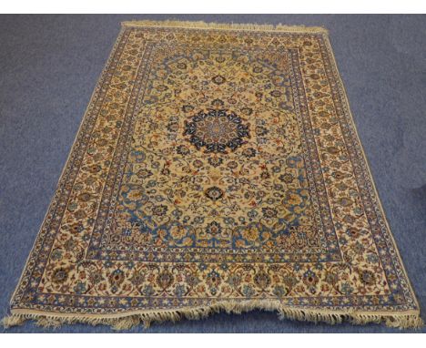 A central Persian&nbsp;Isfahan carpet: very finely knotted wood, good condition overall, central light blue and dark blue mon