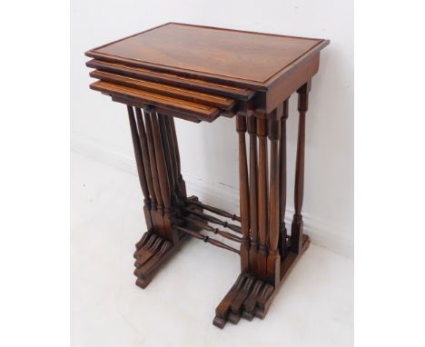 A set of four early 19th century late Regency period rosewood quartetto tables: the second table top inlaid with parquetry ch