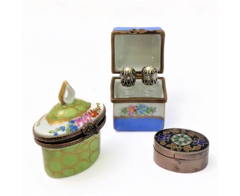 A French porcelain, gilt-metal mounted centre casket: externally decorated in enamels with floral sprays, the lid opening to 
