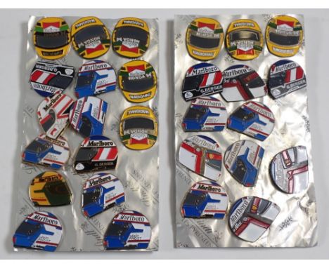 A group of motor racing helmet form badges including Prost, Mansell, Berger etc.
