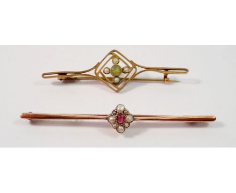 An Edwardian 9 carat gold brooch set peridot and seed pearls, 2g, 5cm and a 9 carat gold bar brooch set ruby and seed pearls,