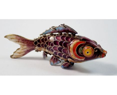 An enamel articulated fish pendant, 7.5cm long