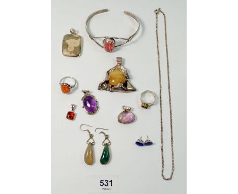 A group of silver jewellery including green enamel ring, silver and malachite brooch marked GFMN etc. plus an unmarked white 