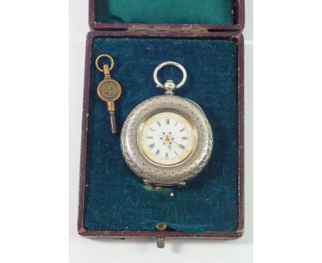 A 935 silver fob watch with enamel dial and key 