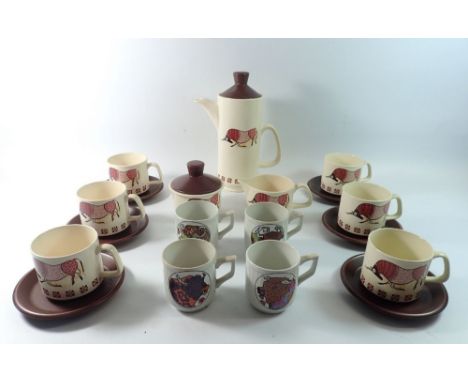 A Royal Worcester Palissy Taurus coffee set comprising coffee pot, milk, sugar and six cups and saucers plus four ironstone B