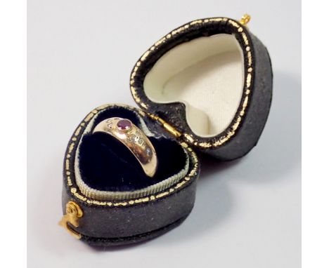A 9 carat gold ruby and diamond ring, 1.6g, size I