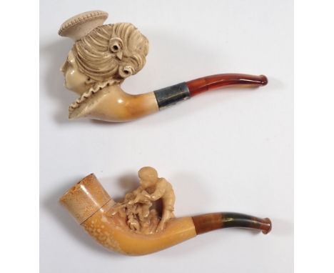 Two antique meerschaum and amber pipe/cheroot holders, one carved as a lady with a ruff collar and the other as a foraging bo