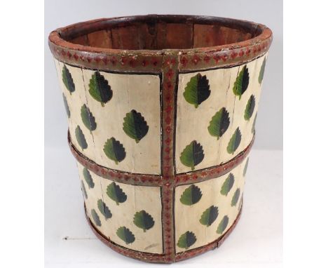 A vintage wooden paper bin or planter with metal banding and painted leaf decoration, 25cm high x 25cm diameter