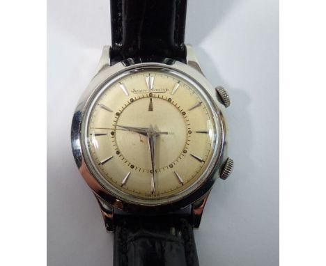 A Jaeger LeCoultre Memovox gentleman's alarm wristwatch, stainless steel case wtih two tone silvered dial on a leather strap,