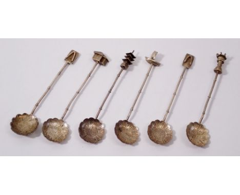 Six Chinese silver spoons with flower bowls and traditional Chinese motif terminals, 42g