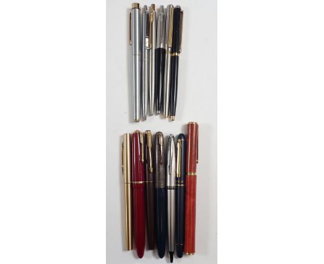 A group of fountain and ballpoint pens including Parker Dufold with 14 ct gold nib, Parker 51 with silver cap etc.