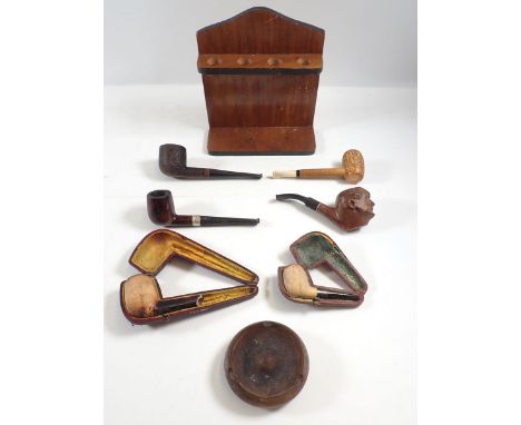 A collection of old pipes including pipe rack 