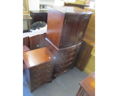 A modern mahogany bow fronted cabinet having two cupboard doors above drawers and a single cupboard below, together with a sm