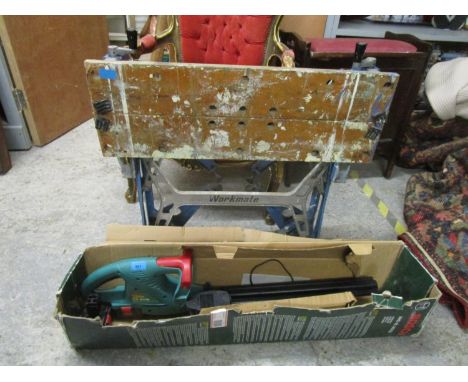 A boxed Bosch AHS L1 Accu Cordless hedge trimmer, and a Black and Decker work bench 