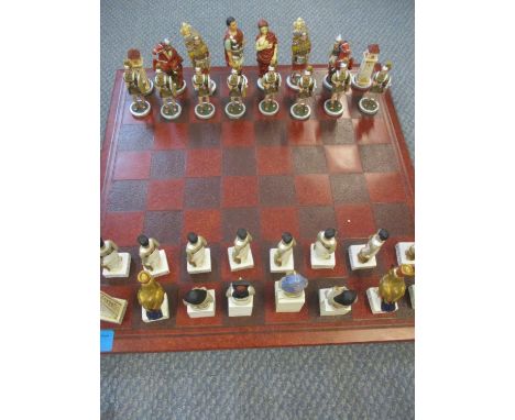 A 20th century chess board with Egyptian figures as chess pieces 