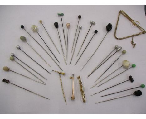 A quantity of hat pins, together with yellow metal items to include a 9ct tie clip, a 9ct and opal bar brooch, and a 15ct par