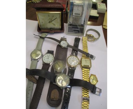 Mixed wristwatches to include Casio, Seeland watch on a military strap and others, together with an Ingersol bedside clock 
