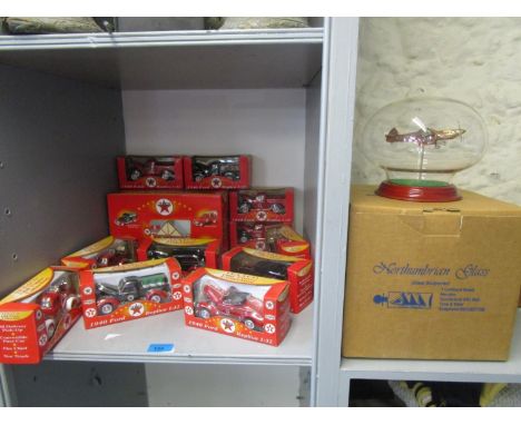 A collection of boxed Texaco Old Timer collection of 1940s  Ford model diecast vehicles and garage, along with a Northumbrian