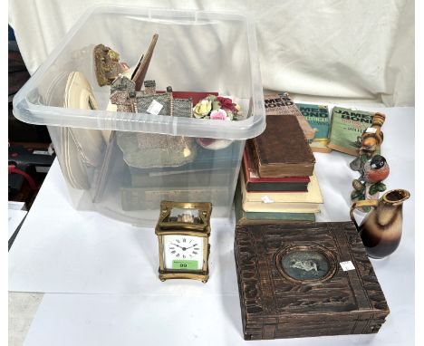 A brass cased carriage clock, a 400-day clock , oak biscuit barrel and a collection of 1960's James Bond Pan paper backs, oth