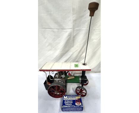 A Mamod steam tractor, spirit powered, with fuel blocks