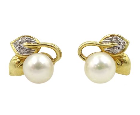 Pair of 18ct gold cultured pearl and diamond chip stud earrings, stamped 18KCondition Report:Approx 2.7gm, length = 10mm, goo
