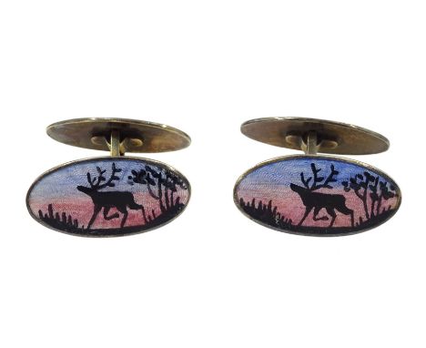 Pair of Norwegian silver-gilt guilloche enamel cufflinks, decorated with sailing boat to one side and moose to reverse, by Da