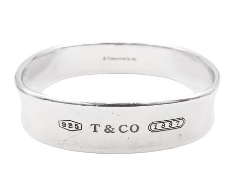 Tiffany &amp; Co silver 1837 square cushion bangle, hallmarked London 2006 and stamped Tiffany &amp; Co 925, with original po