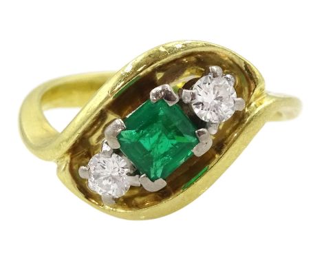 18ct gold three stone square cut emerald and round brilliant cut diamond cross over ring, emerald approx 0.45 caratCondition 