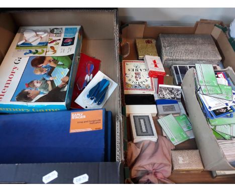 A box of mainly playing cards and collectors cards 