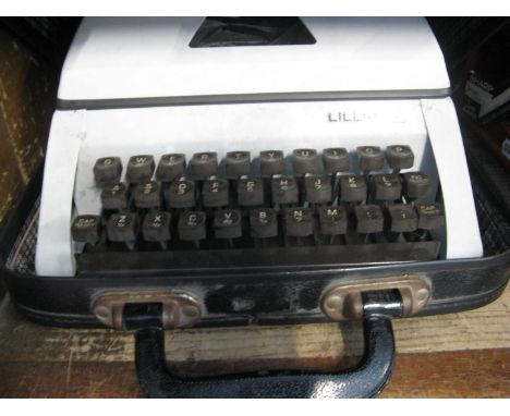 A Lilliput portable typewriter 