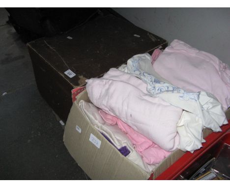 A vintage case and a box of bedding and curtains 