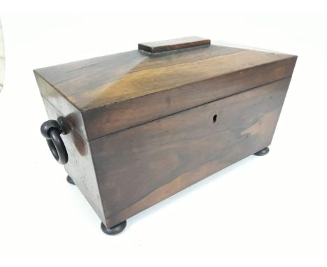 A Regency rosewood tea caddy of sarcophagus form, length 33cm, as found. 