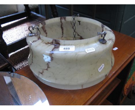 An Art Deco glass ceiling light shade and chains.