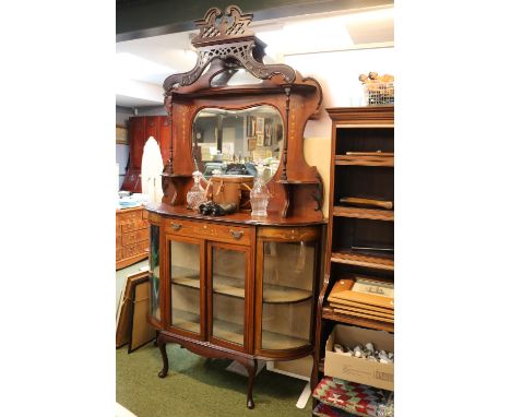 19thC Walnut Inlaid mirror backed Chiffonier with pierced and carved swan neck pediment over turned supports and glazed base 