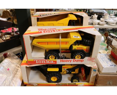 Collection of 4 Boxed Tonka Toys to include Heavy Loader 5201, Heavy Dump 5200, Mighty Dump 3901 and Tractor Trencher 2625 al